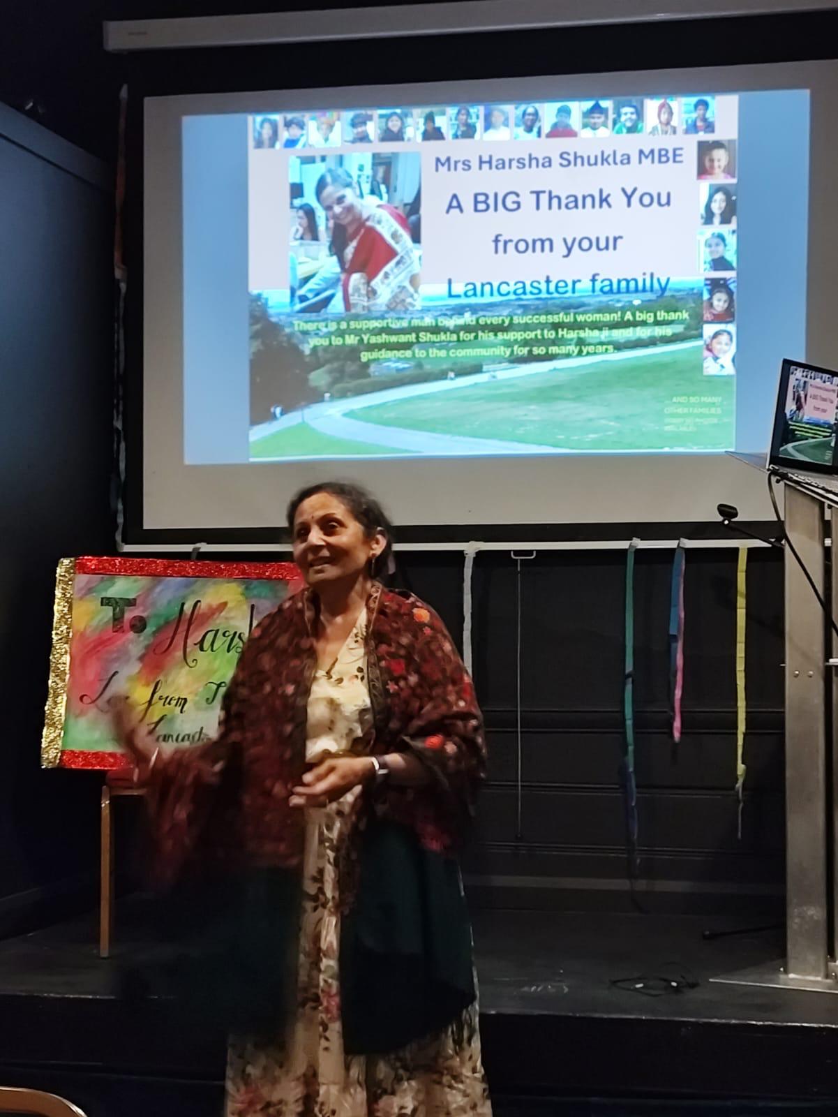 Harsha on stage during the Lancaster family thank-you celebration